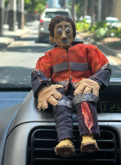 Injured male tradie puppet